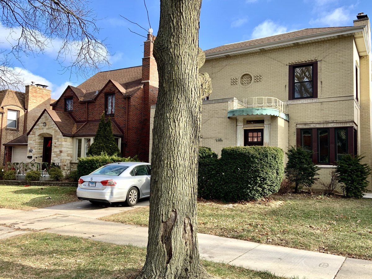 Around the same time, Carlson built and advertised two model homes, one sort of an Art Moderne take on Georgian, and the other a conventional English style. There’s at least one more of the Georgians, a block away, and several others that bear a strong resemblance.