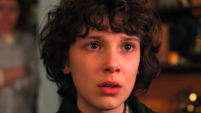 el with curly hair; a thread