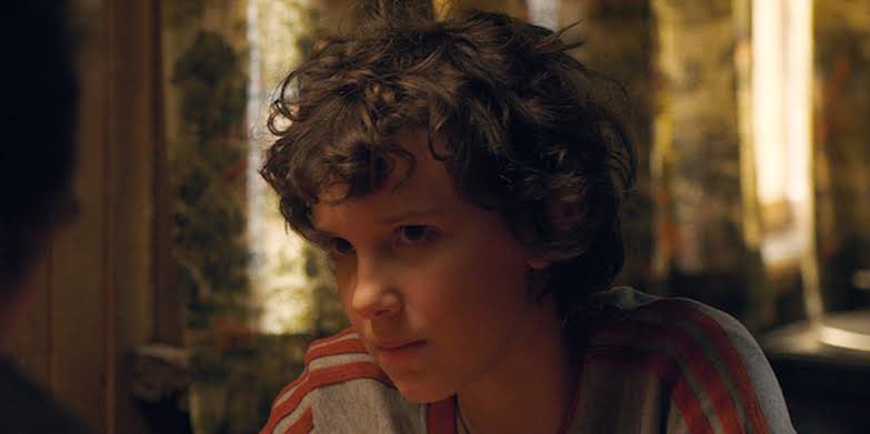 el with curly hair; a thread