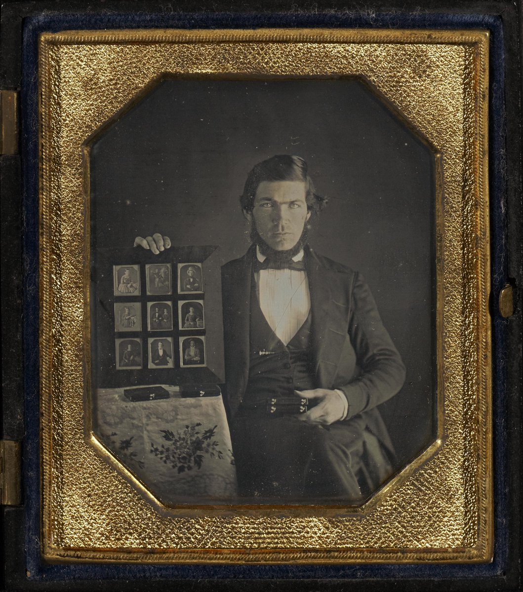 1845 daguerreotype of a daguerreotypist displaying daguerreotypes and daguerreotype accessories in an airtight daguerreotype frame