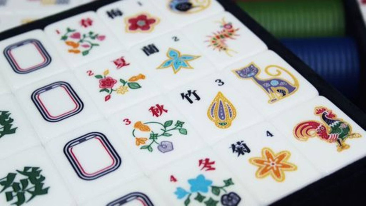 I can't say I've wholly wrapped my head around it yet but I'm loving the cat-eats-mouse chicken-eats-centipede rules around the animal tiles in the Singaporean variant of Mahjong.