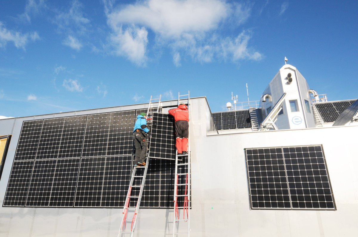 PolarFoundation's tweet photo. Here are few pictures of the BELARE team installing #solar #panels on the front side of the new garage.

They will be wired to the station's microgrid, which manages the distribution and use of the electricity produced. ❄

#electricity  #polarscience #ecofriendly #Antarctica https://t.co/XTYyS2qnik