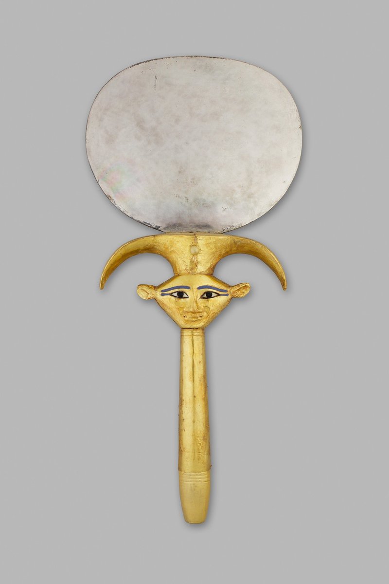 archaeologyart's tweet photo. Mirror with Hathor Emblem Handle Silver disk and wooden handle sheathed in gold, inlays restored. New Kingdom, 18th Dynasty, reign of Thutmose III, ca. 1479-1425 BC. On view at The Met Fifth Avenue in Gallery 118, New York. https://t.co/Rt90dMePIJ