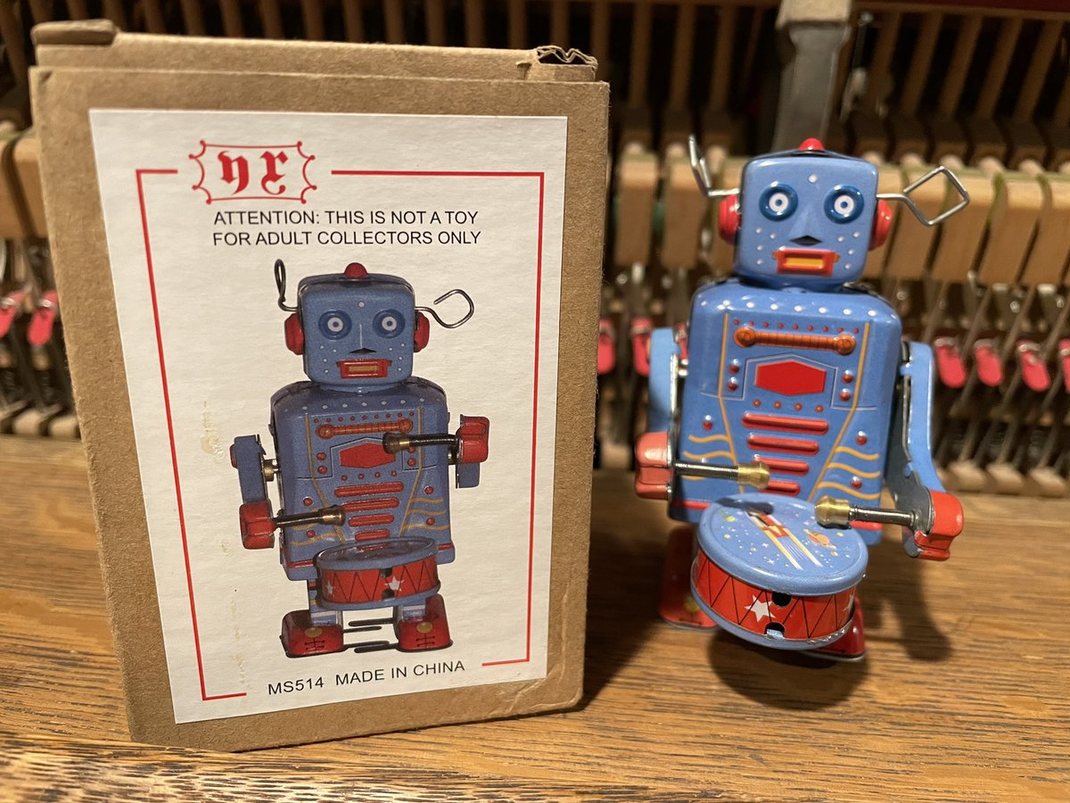 I collect robots. This one came in a box announcing it either as a toy that’s not only for adults, a non-toy for adults only, or a toy that can be enjoyed even by people who don’t collect adults.