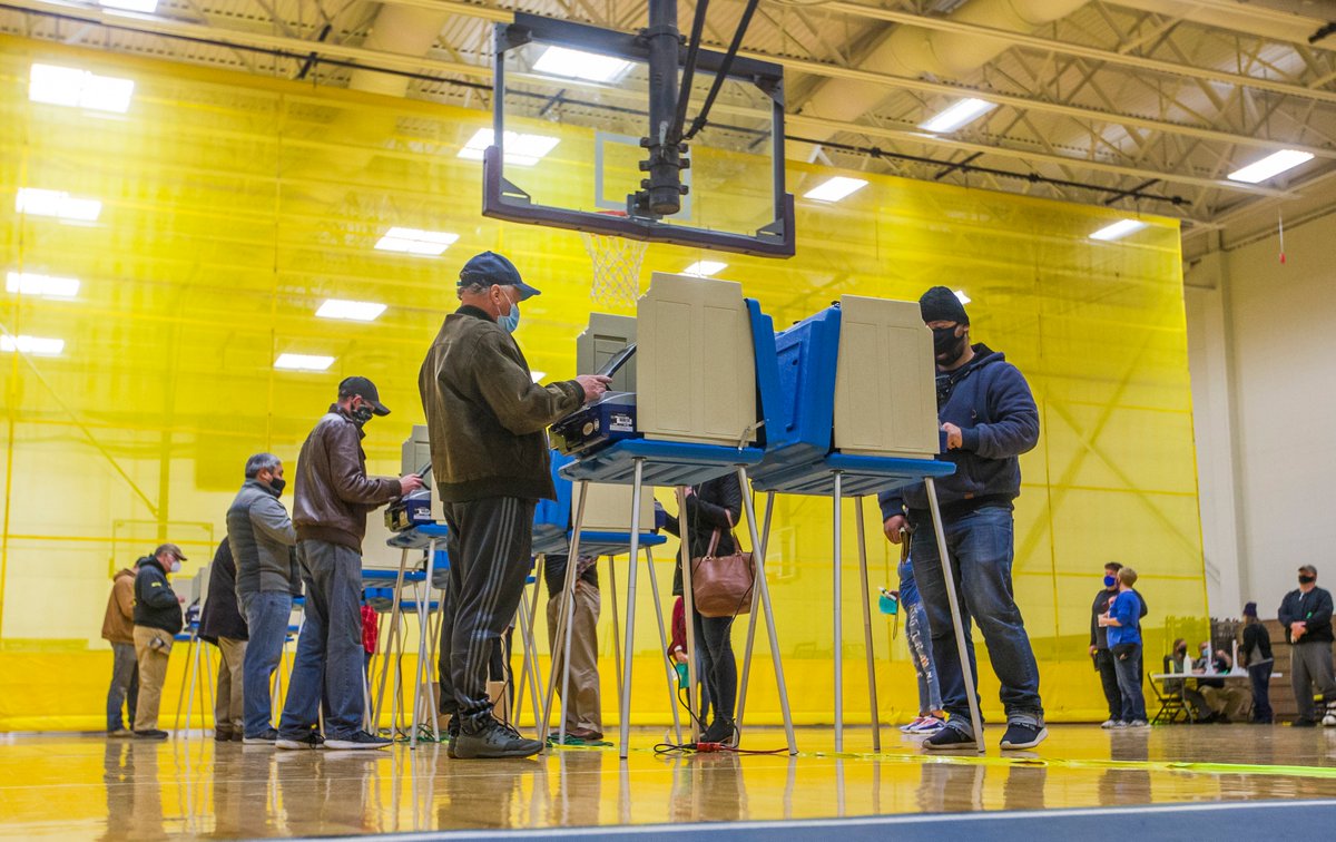 14/15 A presidential election happened. There were long lines and lots of time spent counting ballots.