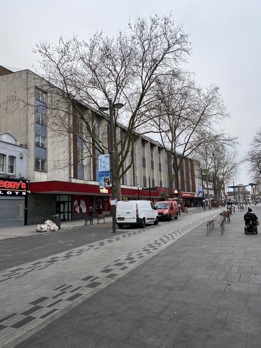 And finally Stratford Broadway - “This is the real centre of the East End now that Stepney has been broken on the planner’s wheel. And a lovely shape it is too, when you can see it for the traffic: a long funnel widening and curling around one of the hungriest looking churches.”
