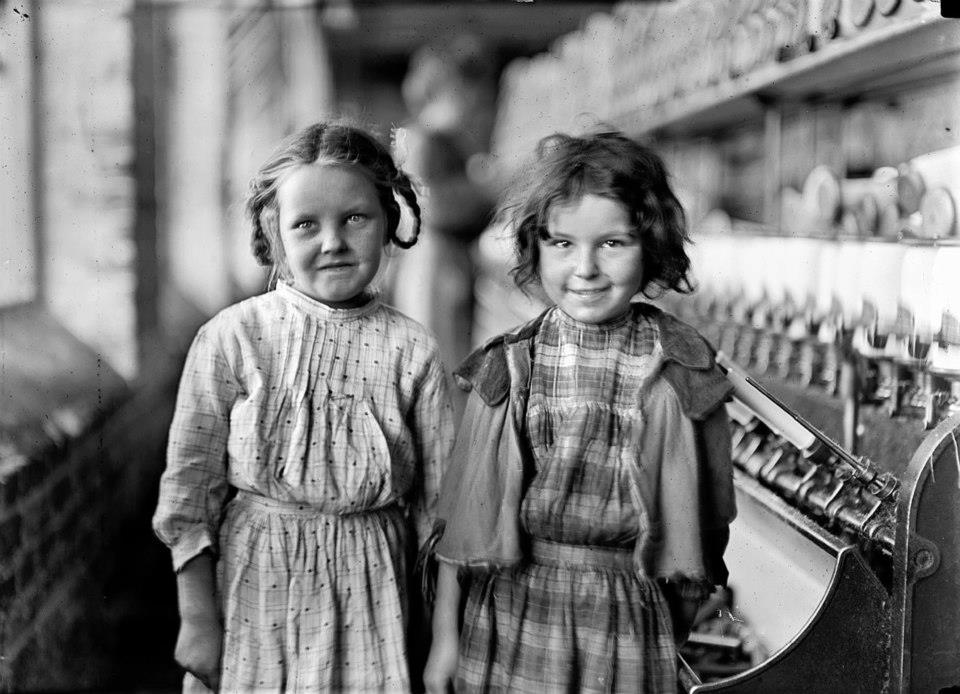 Two of the "helpers" in the Tifton Cotton Mill, Tifton, Ga. They work regularly. Location: Tifton, Georgia.1909, by Lewis Hine.