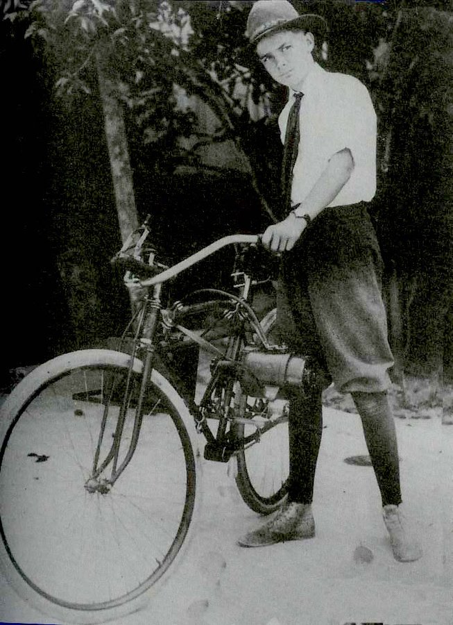 At 12, Hughes was photographed in the local newspaper, identified as the first boy in Houston to have a "motorized" bicycle, which he had built from parts from his father's steam engine.