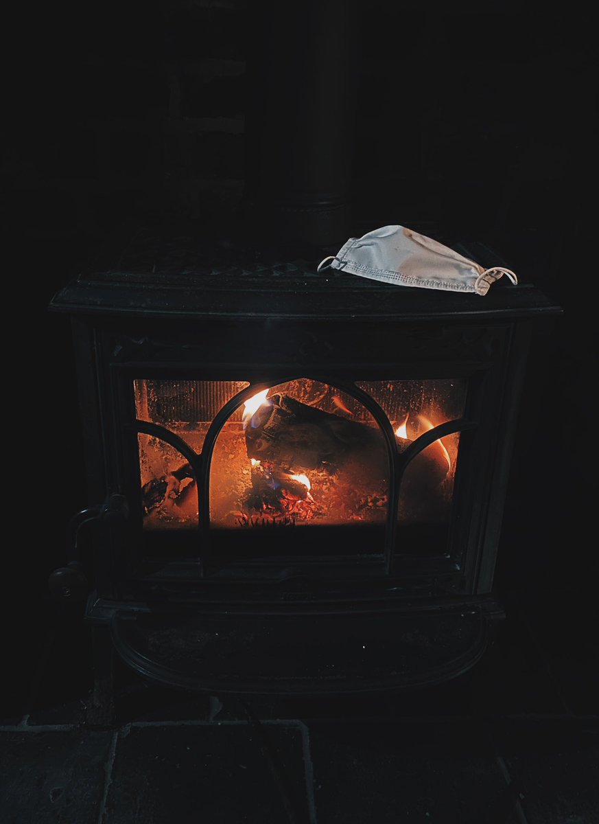 Nothing says being at home during a pandemic than mum panic-drying a face mask atop the log burner..