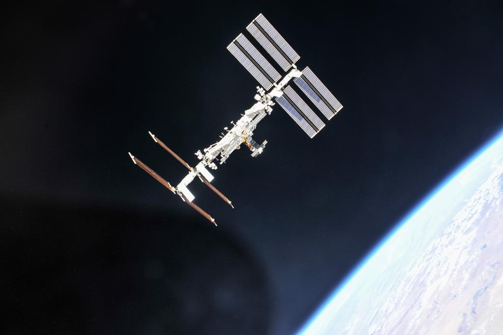 International Space Station in orbit with Earth visible below