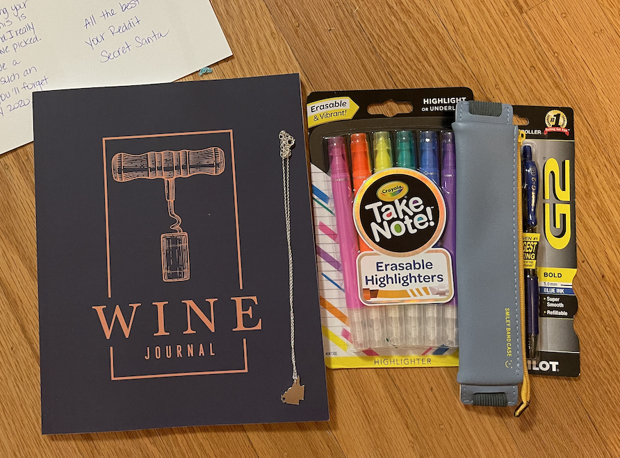 chelseynelson's tweet photo. This was the first year I participated in the @reddit Secret Santa and I think I'll be doing this every year from here on out. They got me a necklace with a heart in Brisbane and a wine journal! #RedditSecretSanta https://t.co/7Afy34xuQe