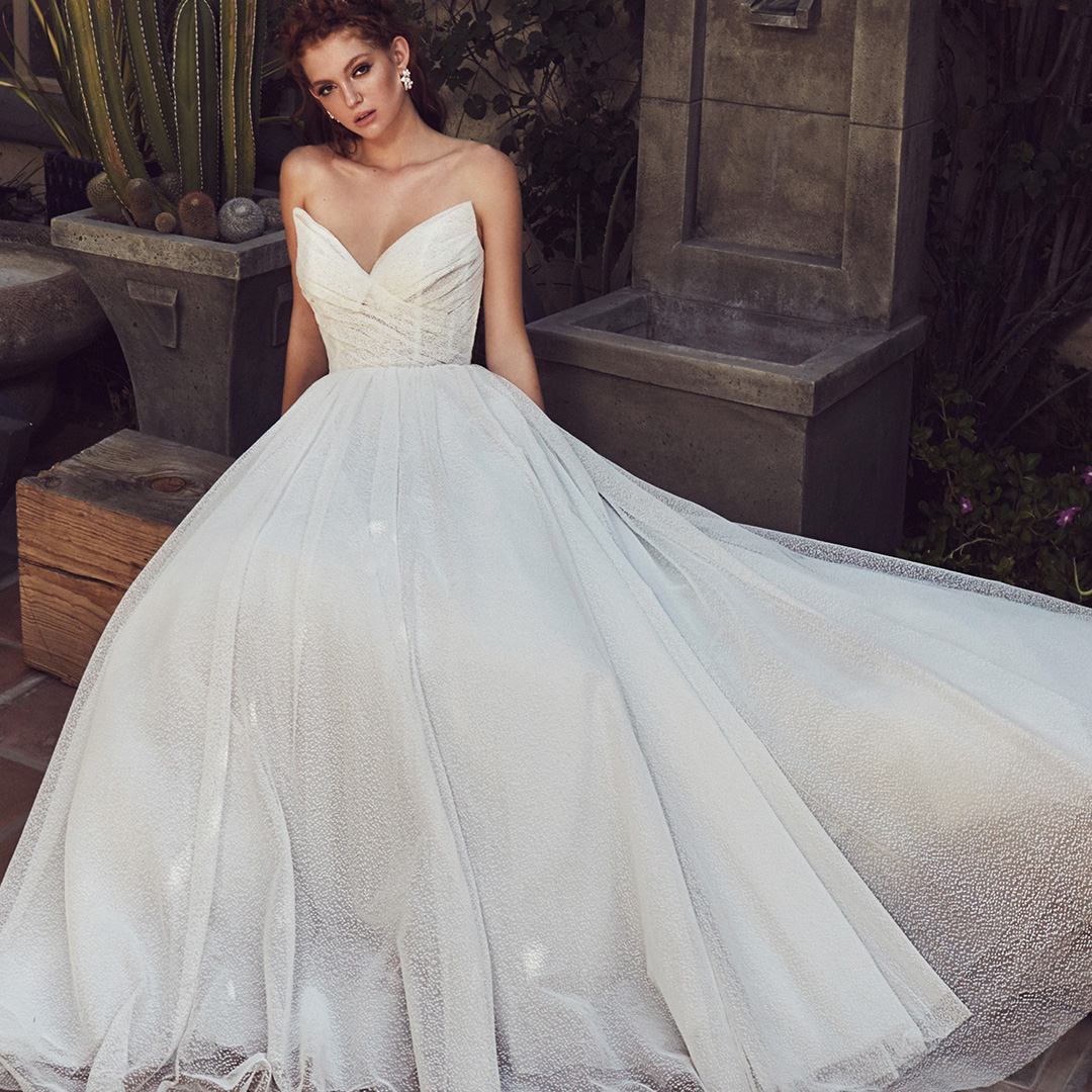Feminine, flirty & fabulous! 💖Exude glamour in this tulle wedding #ballgown. An #edgy and ultra #trendy #sweetheartneckline #strapless gown with an exquisite fluffy skirt. The bonus? Zoom in and take a look at the texture! Nadya LA9115 is a #fashionista’s  dream #weddingdress!