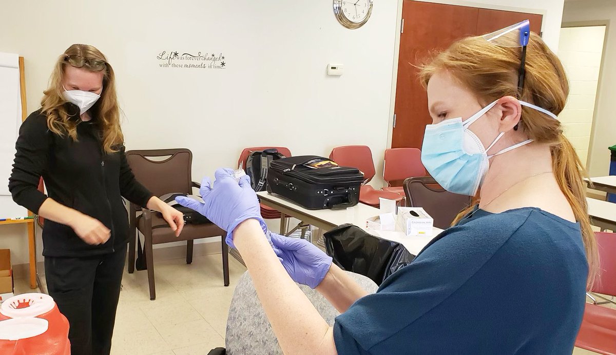 SigHealthInc's tweet photo. Signature Health’s Chief Medical Officer, Libbie Stansifer, MD (right), and Medical Director of Infectious Disease, Sarah Hoehnen, DO, are volunteering with the @CCBH_Net to administer #COVID19 vaccines to first responders &amp; healthcare workers. #cle #volunteer https://t.co/1JzCFuWq0R
