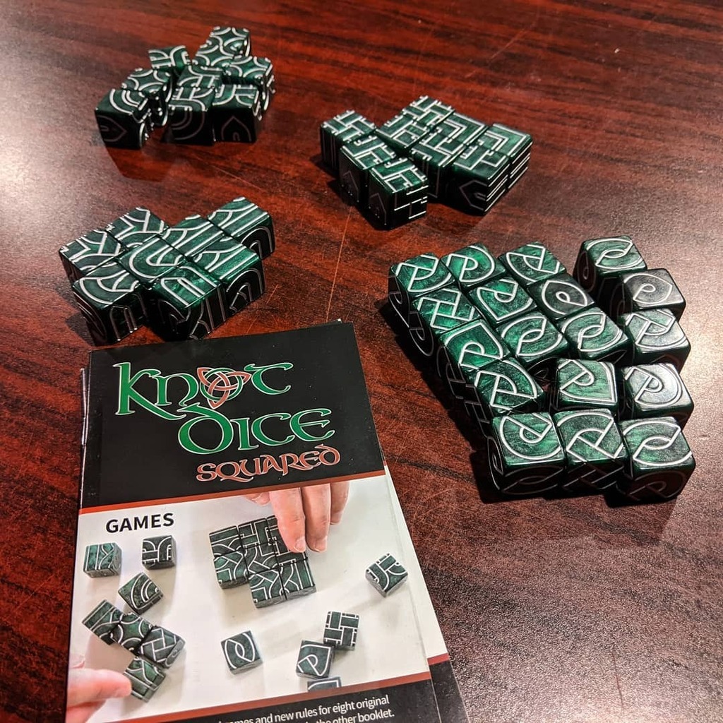 TabletopBellhop's tweet photo. My full set of Knot Dice. The base set and Knot Dice Squared. 

#KnotDice #Knotwork #CelticKnots https://t.co/OeTsj5aTmt https://t.co/InJPjBGw3Z