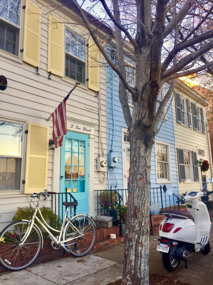 So still in the Heights and turning down  #LeeStreet, the sun is loath to quite call it a day, casting its shadows and a lovely glow. Charming, welcoming  #architecture, no two homes the same. (Love the his and her wheels.)