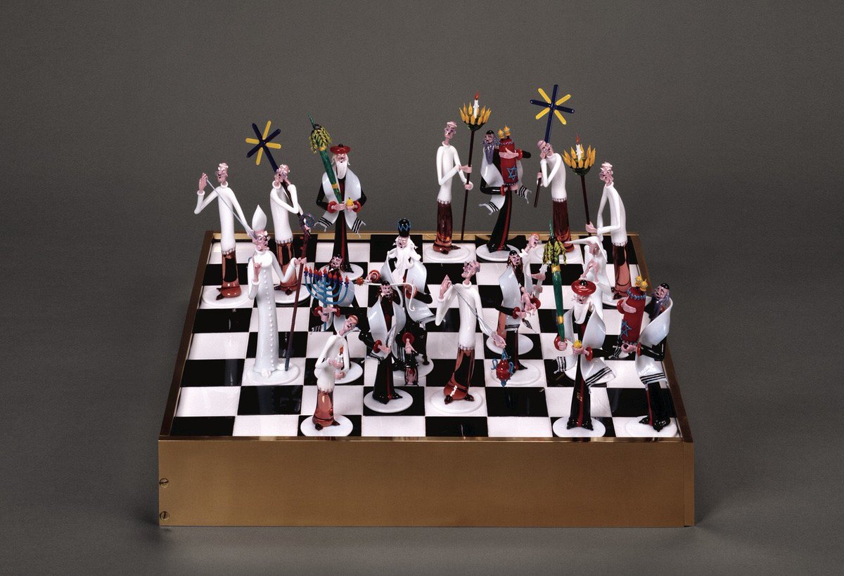 Gianni Toso VeniceAbout 1981Flameworked glass figures; cut and assembled glass The pieces in Gianni Toso’s Chess Set, made about 1981, are Jewish and Roman Catholic worshippers. The kings are a rabbi and a bishop.