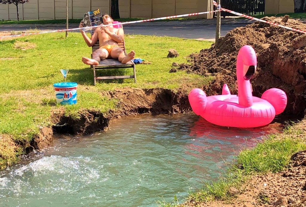GoodThingsGuy's tweet photo. Who Needs A Beach? Fourways Resident Vacations by His Pothole! - https://t.co/vqucoELFKH https://t.co/XG5w71cjBi