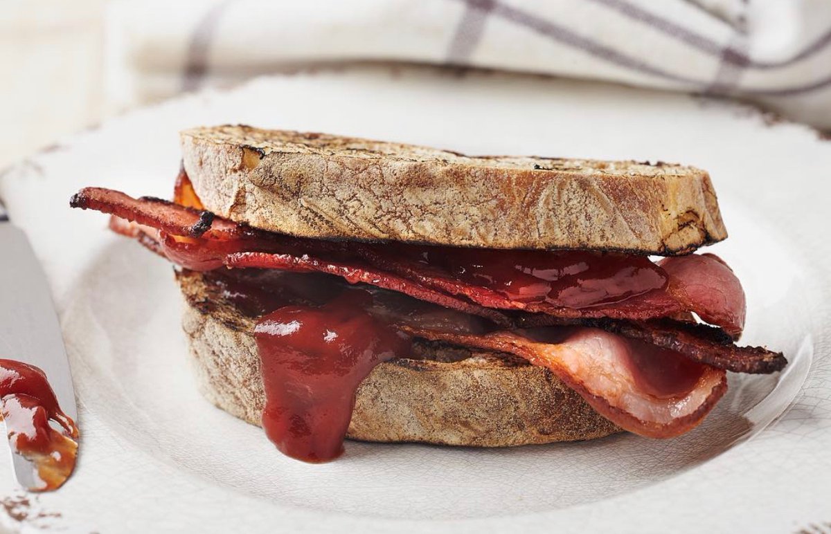 Buttered, toasted sourdough, grilled smoked @parsonsnosebutchers streaky bacon and a generous spoonful of @stokes_sauces fabulous tomato ketchup. 

Good morning everyone! #BaconSandwich