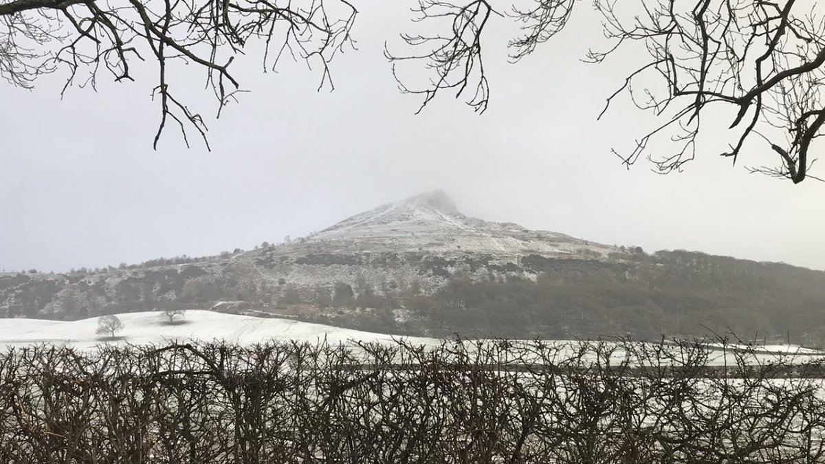 JimmyMac001's tweet photo. #Roseberry Topping looking beautiful in the snow. My 6 year old son just renamed it Snowberry Topping ❄️ https://t.co/2kzQoUuO1P