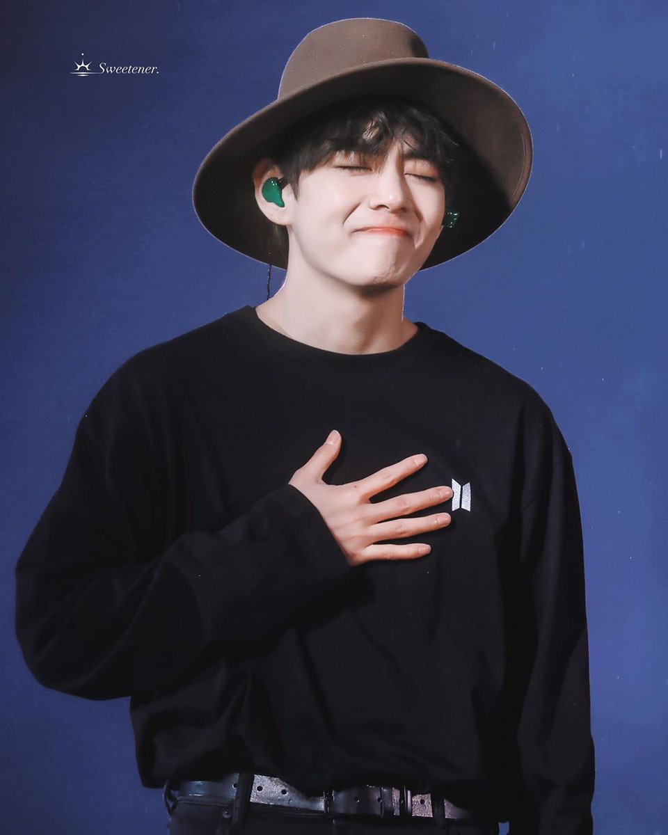 This brown Fedora Hat making him look even cuter. 