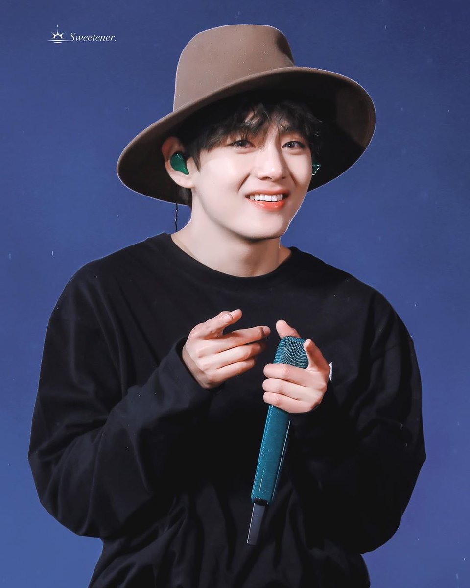 This brown Fedora Hat making him look even cuter. 