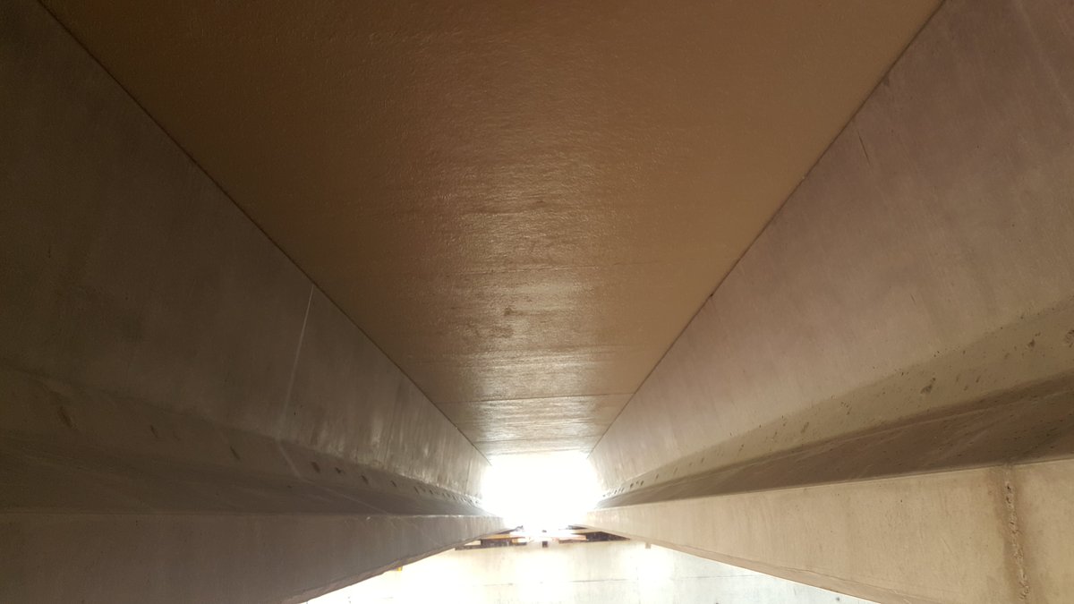 These precast panels can be made from glass-reinforced plastic; some come with steel ribs in for extra strength. They span between beams closing the gap, the concrete is poured on top and they are left in place.