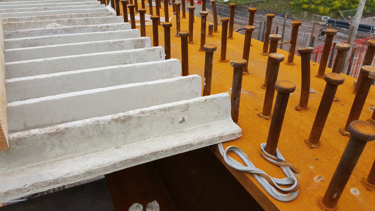 These precast panels can be made from glass-reinforced plastic; some come with steel ribs in for extra strength. They span between beams closing the gap, the concrete is poured on top and they are left in place.