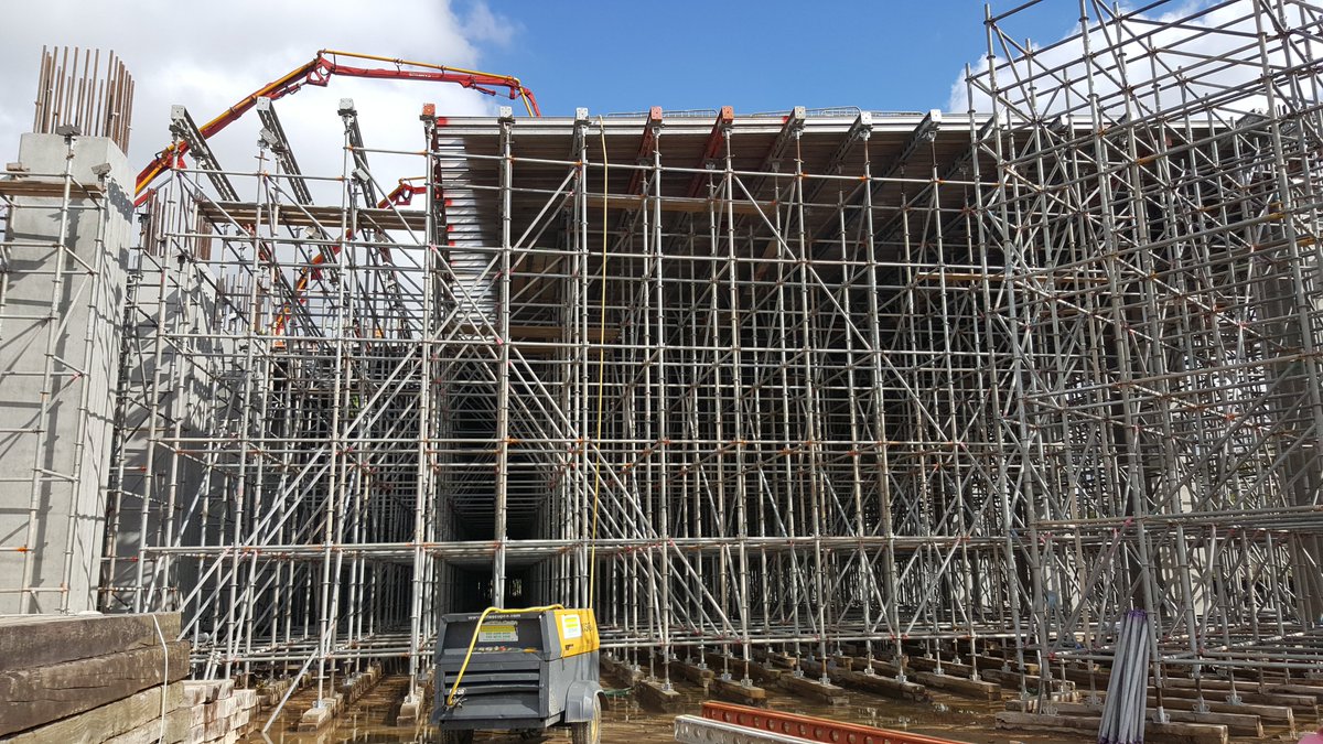 A uniform slab can only span so far, around 20m. But increase the thickness of the concrete, and you can span further, 30-40m. However building all of this on site takes time, and time increases costs, so precast concrete is used.
