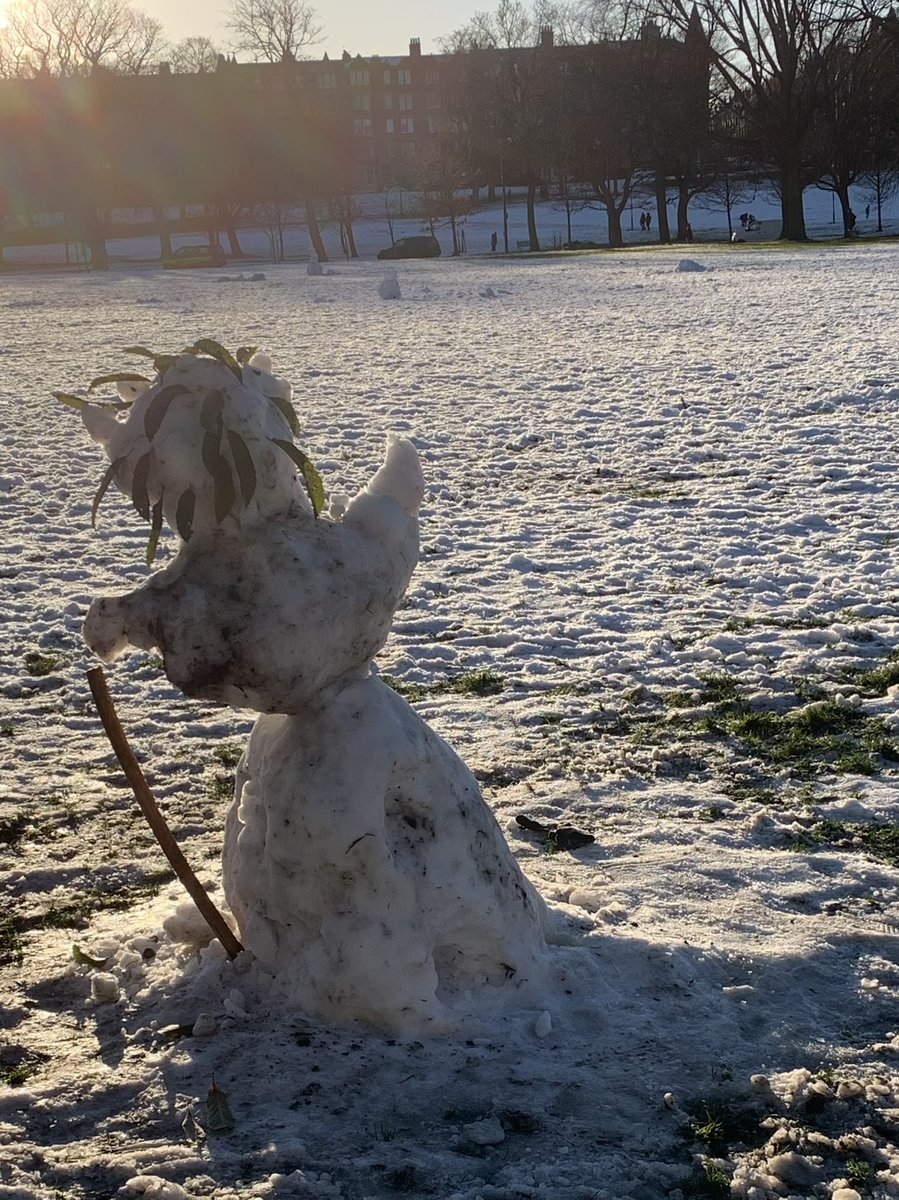 Leaning snowpeople