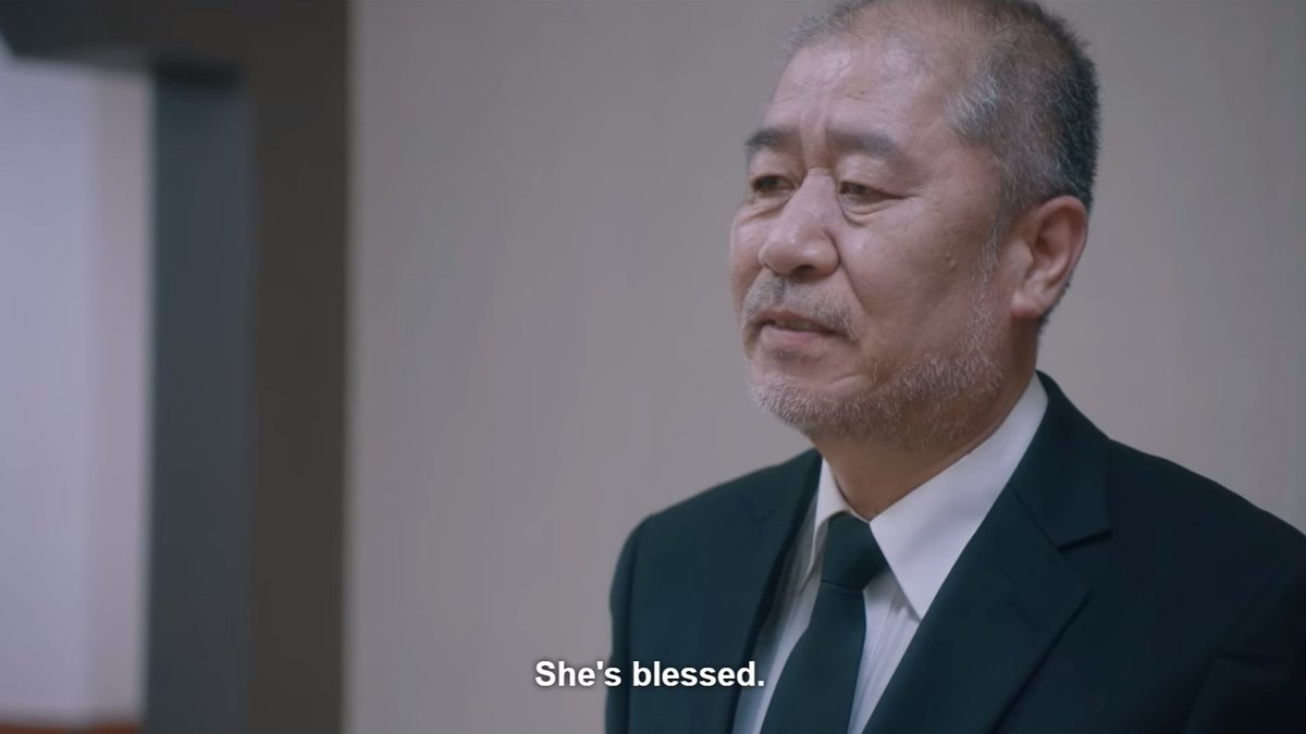 Choon-dae, the first ahjussi that helped and stuck by Jian. During the flashback, I think her mom owed him money too, but he couldn't leave her alone on her graduation. Kindness.I think when he said "She's blessed.", he was really pertaining to Jian. I wish that they hugged. 