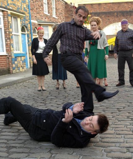 Randy Orton and Batista: Kevin Webster and John Stape ( @_teletext)