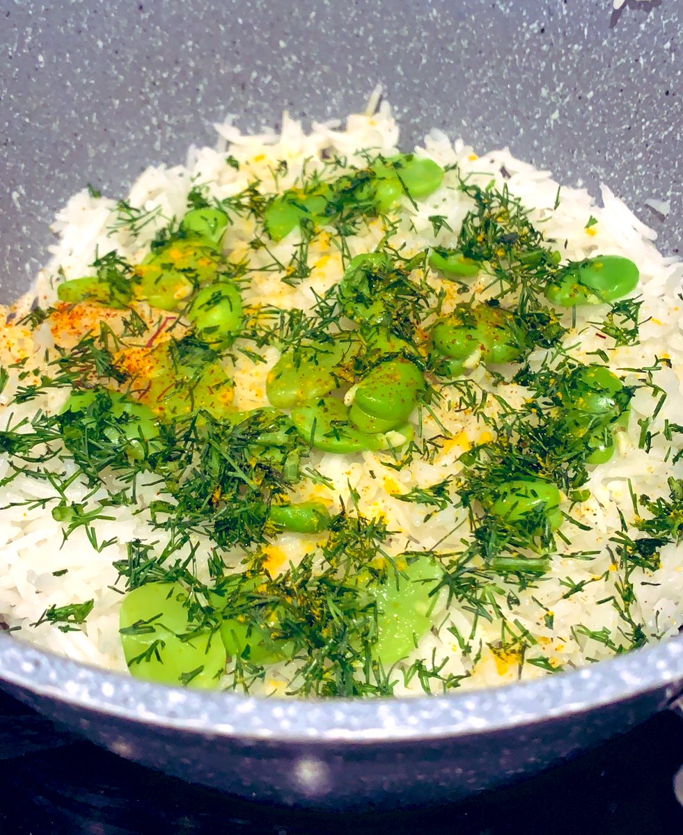 Now comes the faff+++ Put a thin layer of rice, then sprinkle some beans, some dill, some saffron and some turmeric. Repeat in layers. DO NOT compress the rice, try and do Everything as lightly as you can
