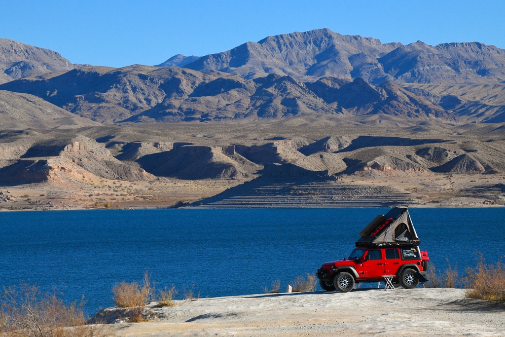 lakemeadnps's tweet image. More than 1,000 miles of shoreline and 700 miles of scenic routes are waiting for you at Lake Mead National Recreation Area. What’s going to be your first adventure in 2021?

NPS Photos/ Sergio Silva Jaramillo 
Image: Red Jeep car camping by lake. 
#findyourpark #