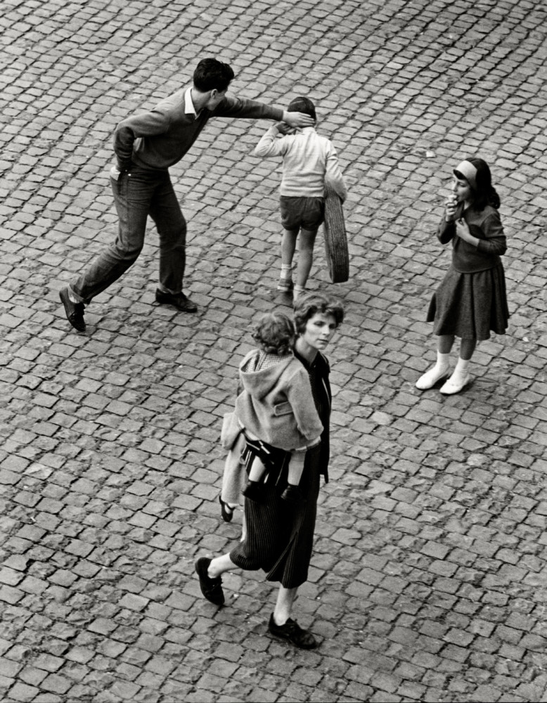 Herbert List.Playing With a Tire., Rome 1953.Scolding for the lost tire. Rome 1953