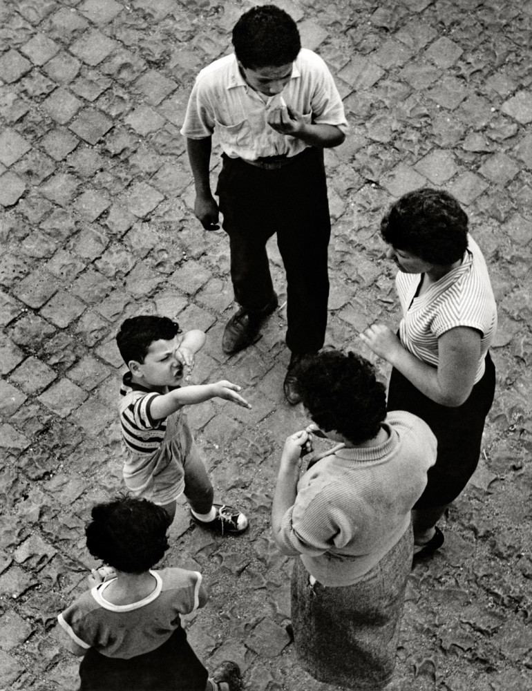 Herbert List. Giovanni puts on a show to get money for ice cream. Rome, 1953
