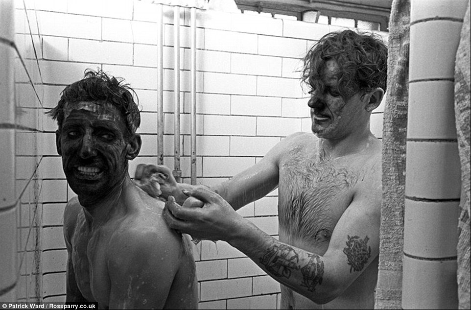 Men showering after their shift at Horden Colliery in County Durham.