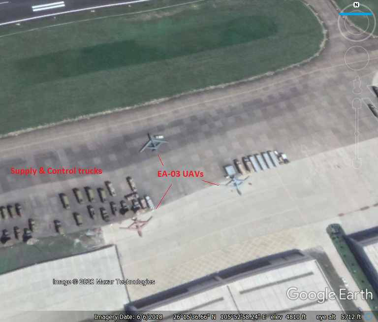 This 6/6/2018 Google Earth image of the 162 Factory for Guizhou  UAV production shows 3x Guizhou EA-03 "Soar Dragons" along with their control trucks and satellite dishes. Right now, the image is oriented North. Can you see which direction the satellite is oriented?2/