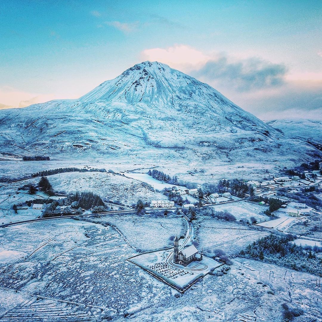 Sacred heart Church overlooked by Errigal Summit Co Donegal this morning

Image by travellernorthernireland