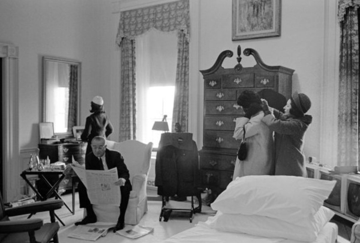 LBJ kept President’s White House bedroom roughly as it was under JFK, but added three TV screens (at right) to watch news on CBS, NBC, ABC (here on Inaugural Day 1965):  #LBJL