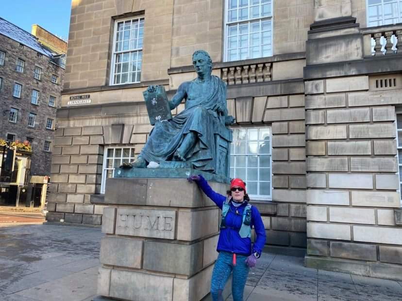 Bear, giraffe, column, erudite person