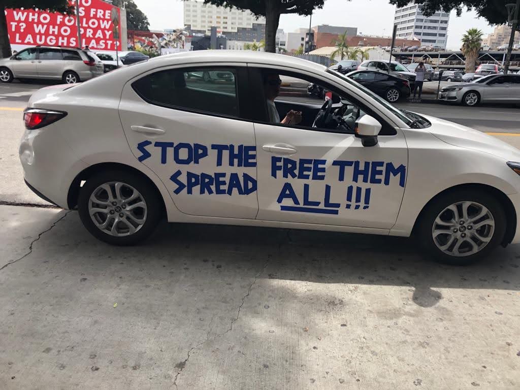On the last day of March 2020, we partnered with folks like  @JusticeLANow,  @HomiesUnidos,  @CHIRLA and many others to have our first COVID safe car rally around the DTLA MDC, demanding that elected officials free everyone in jails and prisons during a global pandemic  #FreeThemAll
