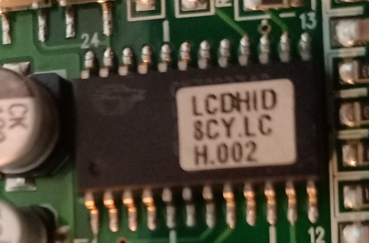 So there's two chips in it.The first one says LCDHID 8CY. LC H.002 And the other one is LCDHID AT.LCH .008