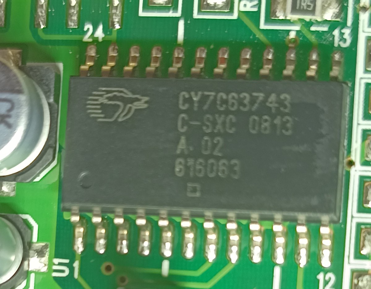 The first one is a CY7C63743That's a Cypress Semiconductor Low-Speed USB & PS/2 Peripheral Controller.Place your bets as to if this is a Fancy 8051...