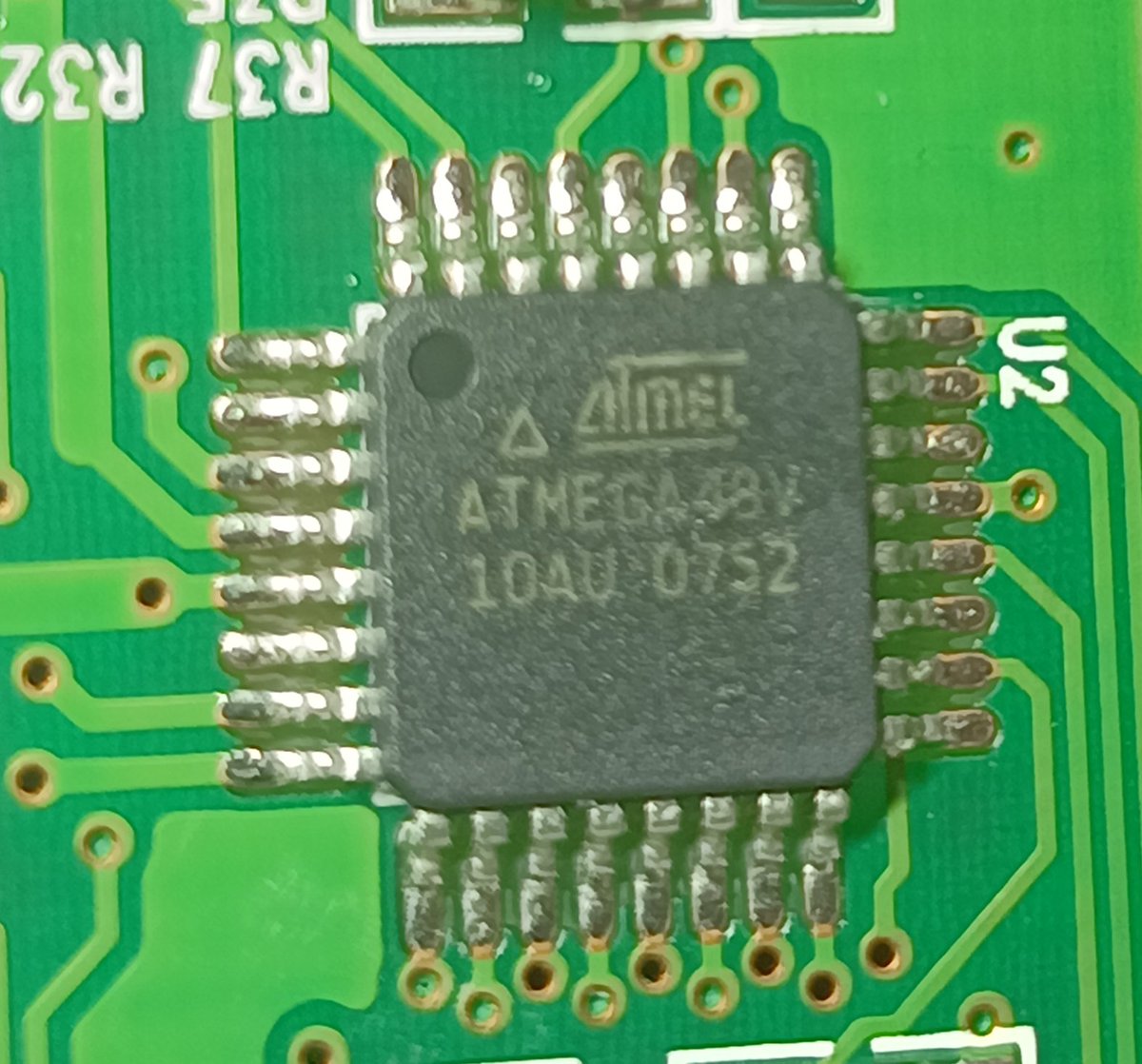 And the other chip is an Atmel ATMEGA48V.That's the well-known AVR series of 8-bit microcontrollers.So this is basically an Arduino. Cool.
