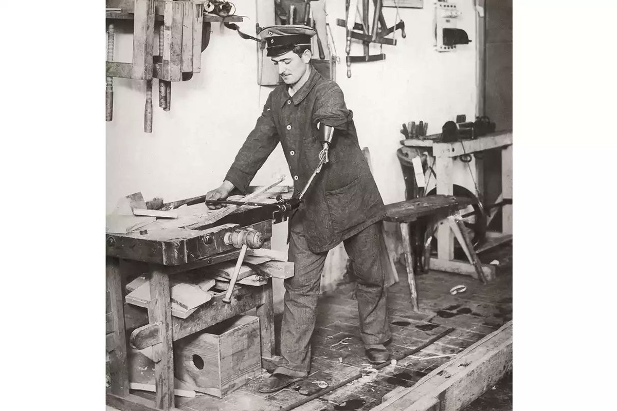 Each country had millions of disabled. Here is a German veteran doing carpentry without an arm.