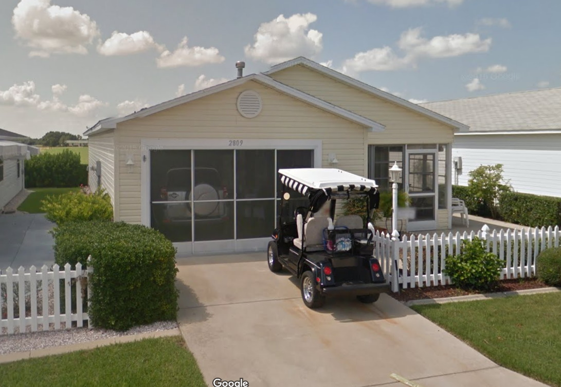 The narrow street helps make small lots more economically feasible. These homes each sit on around 3,500 sf and sell for less than $200k. Garages are specifically designed to accommodate one car and one golf cart, and feature a sliding screen door in addition to the usual door.