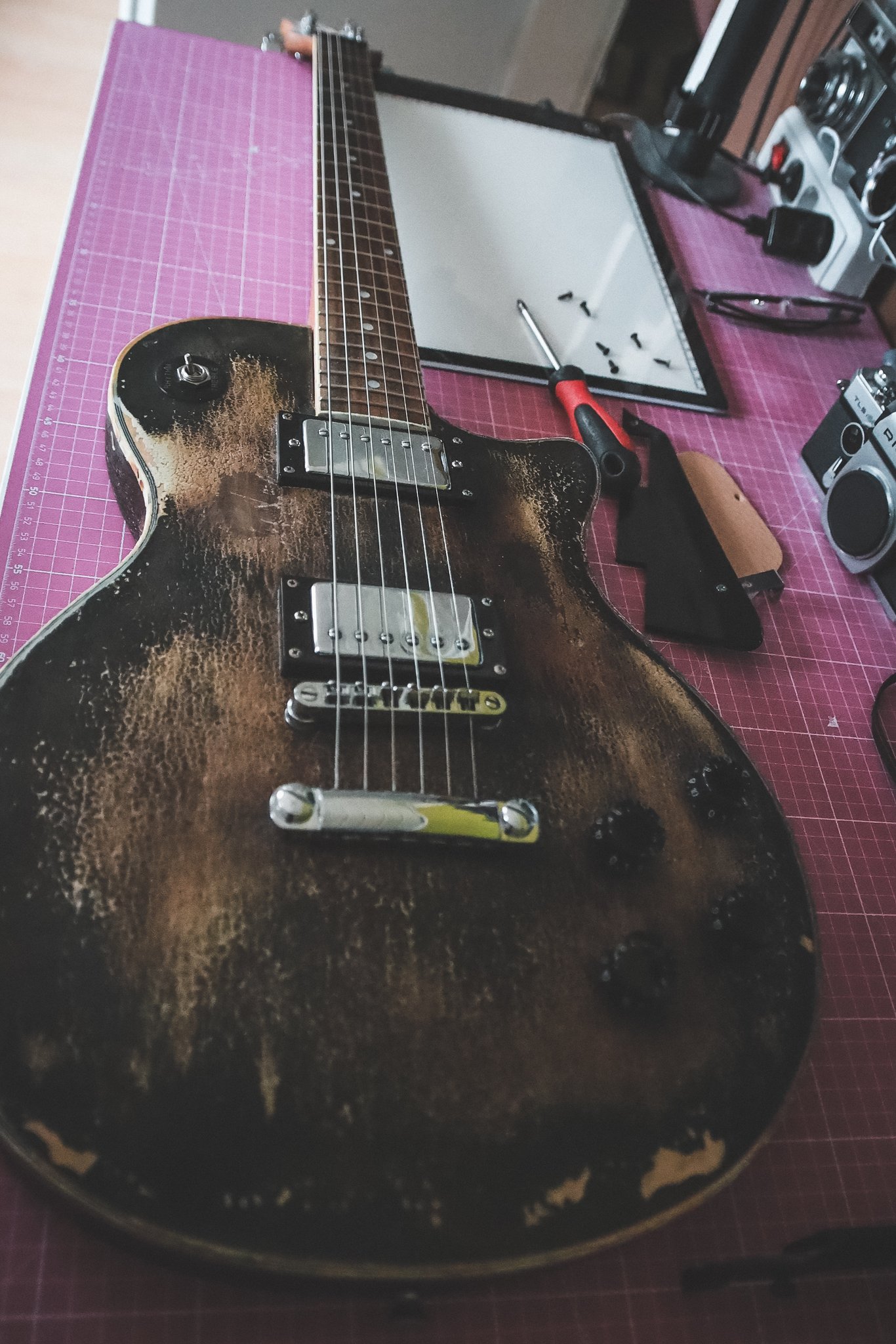 New project: making this thing actually sound and play nice. Needs some new potis and lots of bridge/neck