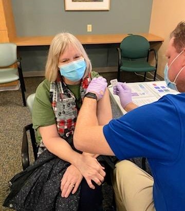 My wife is an RN in the Rheumatology Clinic at The University of Wisconsin Hospital &amp; Clinics. She got her COVID vaccine this morning. Proud of her! Please get your vaccine when you're eligible and let's conquer this thing!