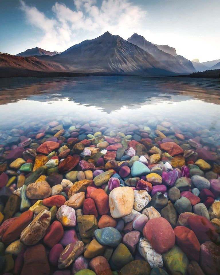 Interior's tweet photo. Many spots @GlacierNPS are visual candy, but the colorful rocks at Lake McDonald are sublime. Pic courtesy of David Rule #Montana 

#ICYMI We're looking back on the favorite posts of 2020 #Top10of2020 https://t.co/WCAnbk95xm