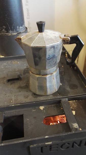 I finally installed a shavings burner in the workshop. Not only does it mean my fuel is effectively free, but it also serves as a coffee maker...and I'm warm in the workshop for the first time